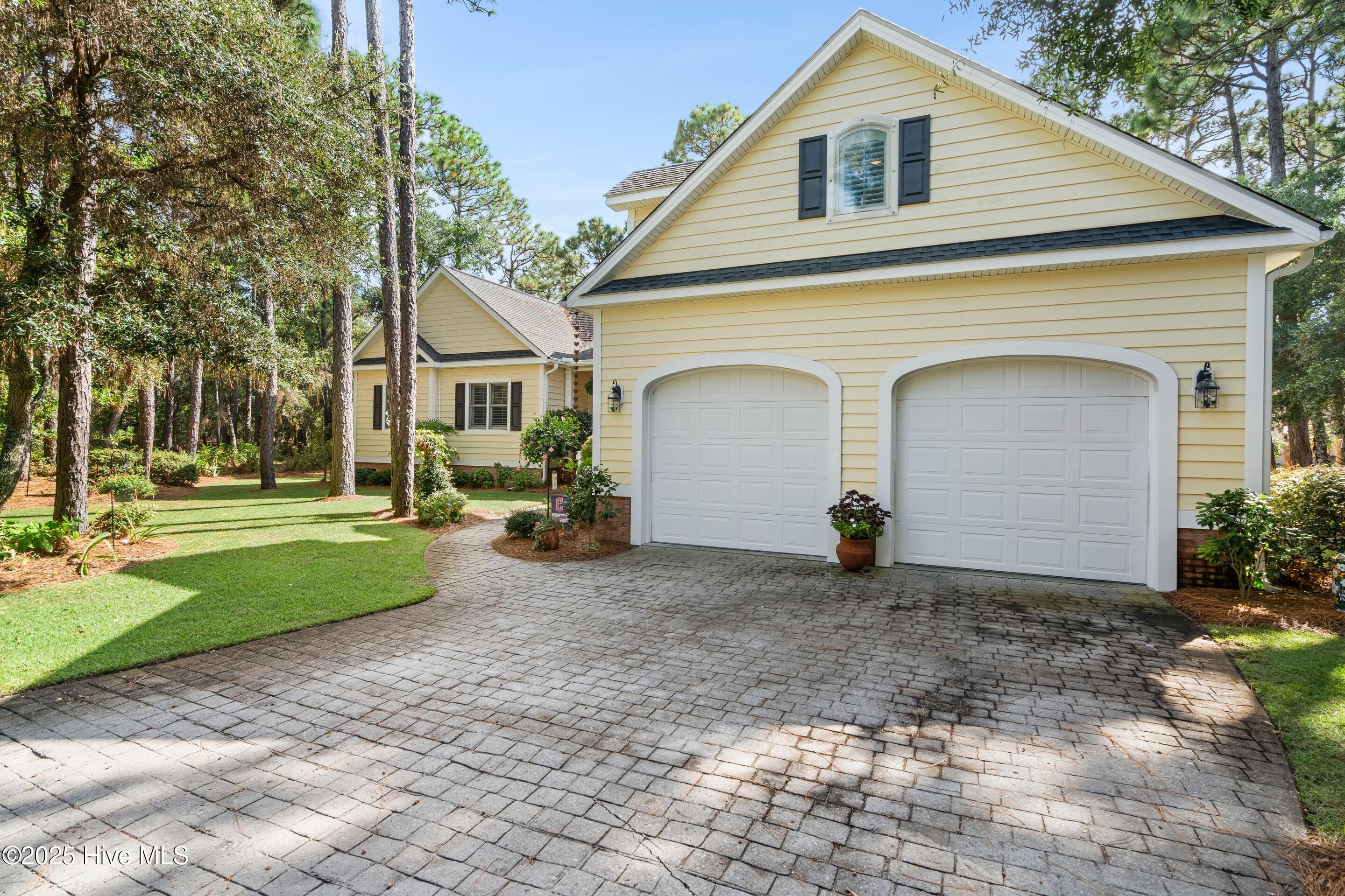 501 Periwinkle Way, Caswell Beach, NC 28465 – photo 19: mls-DSC02181