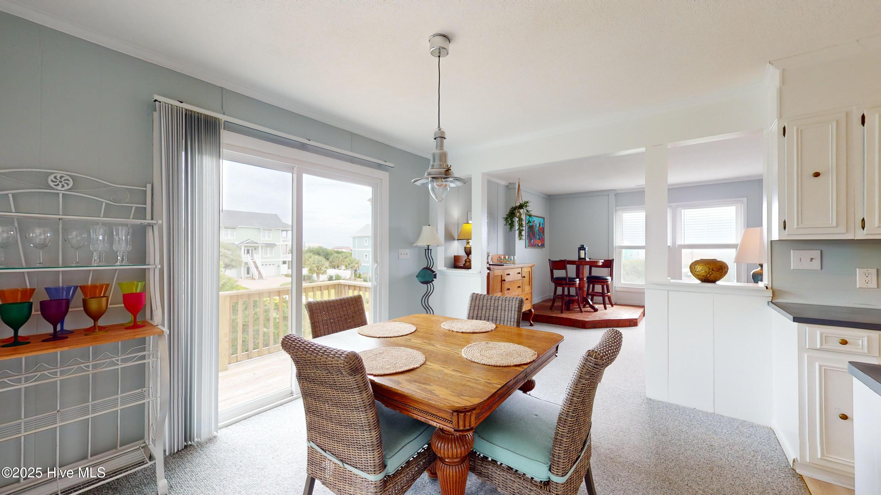 Dining with door to side deck