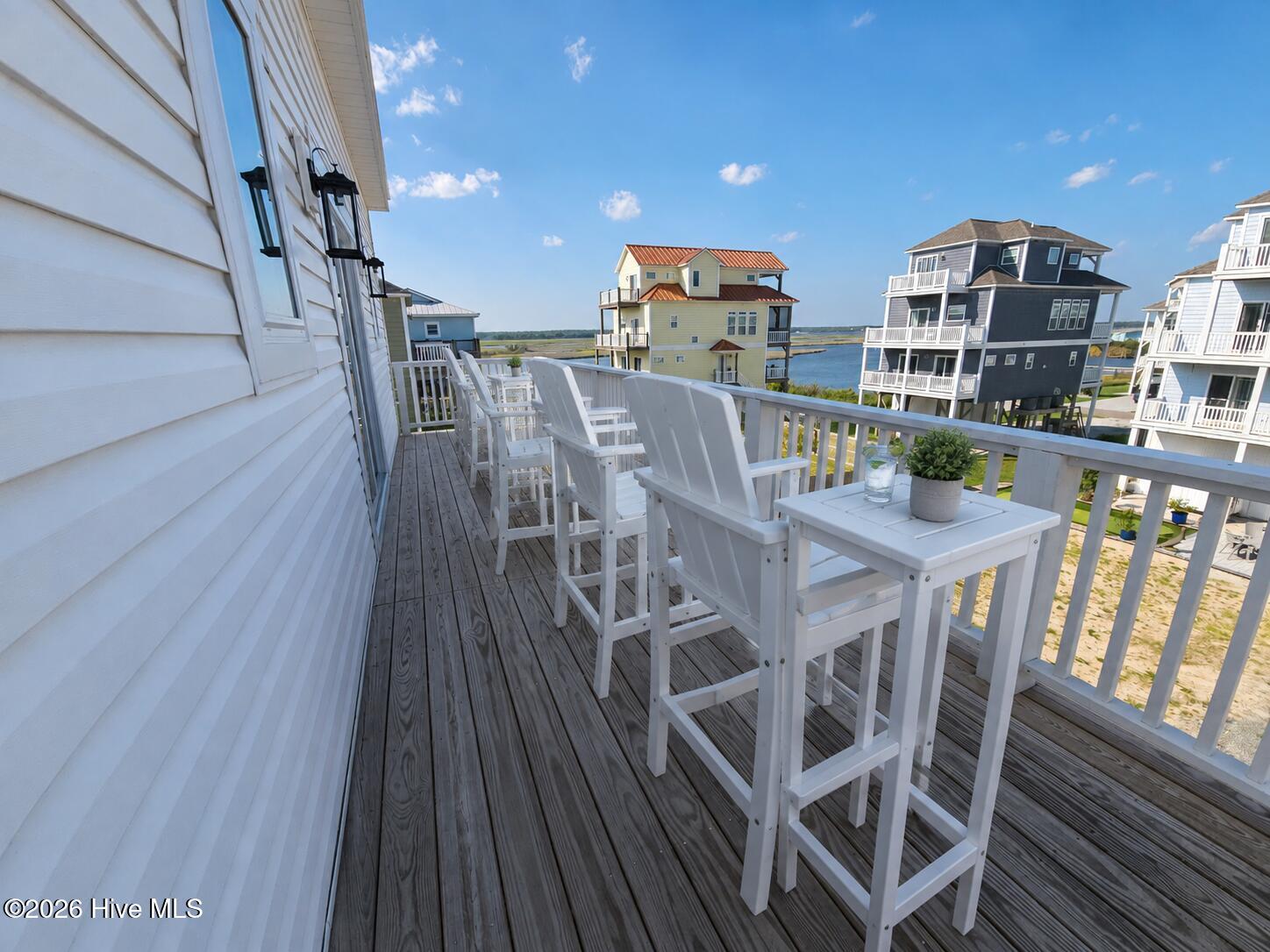 Virtually staged photo of rear 2nd floor deck