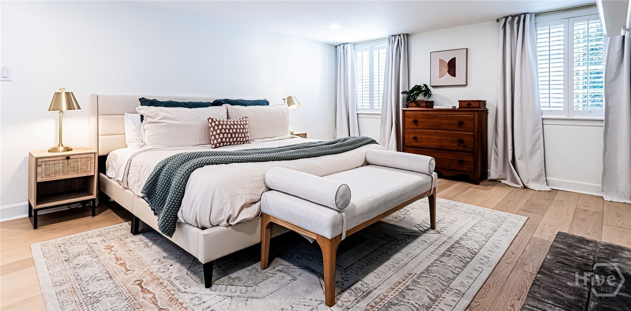 Garden primary bedroom with king bed