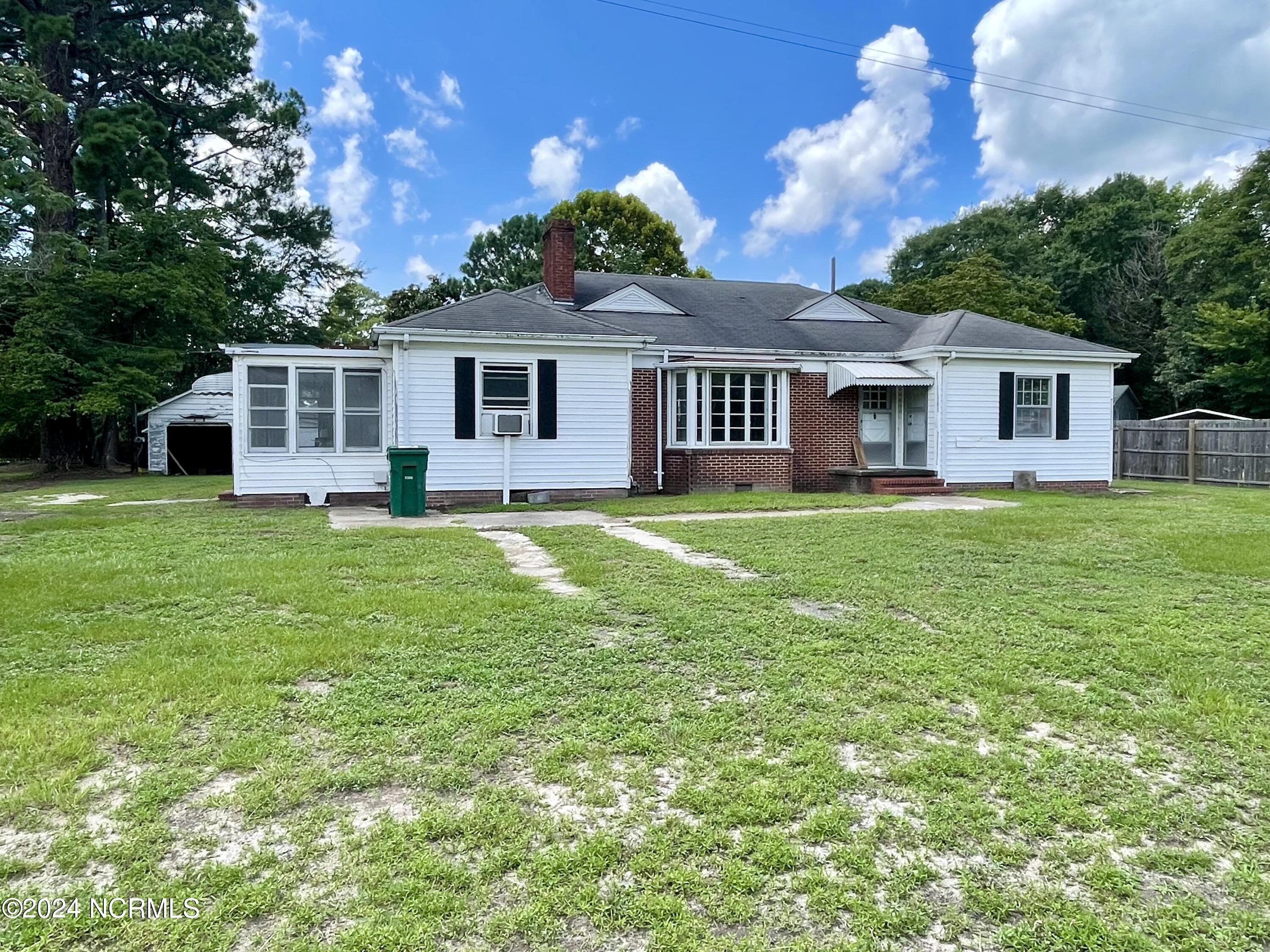 Exceptional commercial opportunity in the bustling business hub of Williamston, NC! This property, featuring a residential building now re-zoned for Highway Commercial use, offers incredible potential for your business vision. While the structure may need some updates, its conversion to meet your commercial needs is straightforward and achievable. For those seeking additional space, this property can also be combined with the adjacent parcel located at 1830 US Hwy 17 Williamston that is also for sale.
Location is everything, and this property delivers. Positioned directly on the heavily traveled US Highway 17, a four-lane corridor with an average traffic count of 9,200 vehicles daily, it guarantees prime visibility and exposure for your business. 
Don't let this rare opportunity pass you by—contact us today for more details!