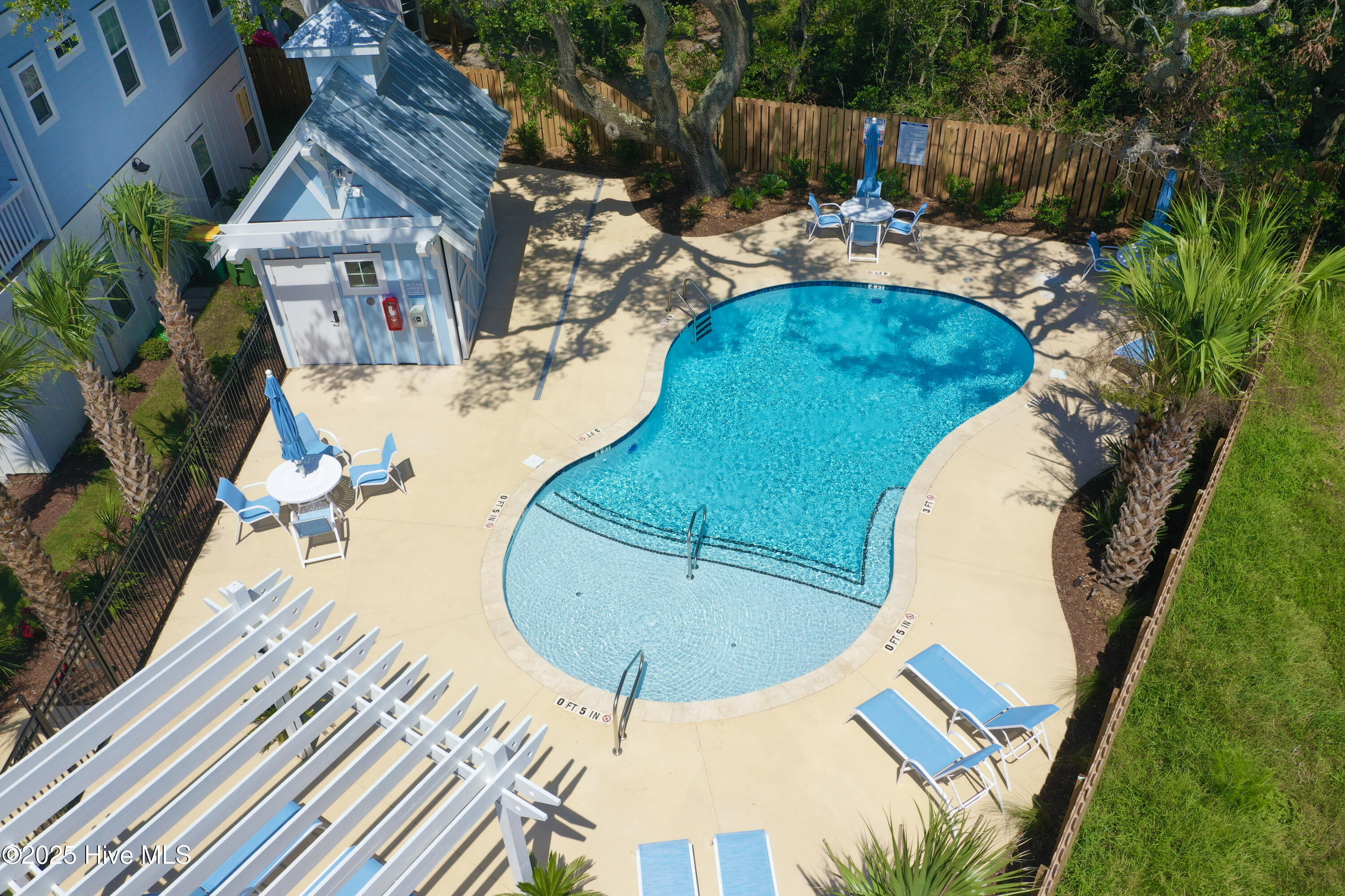 305 Red Lewis Drive, Kure Beach, NC 28449 – photo 19: view of the pool from the deck