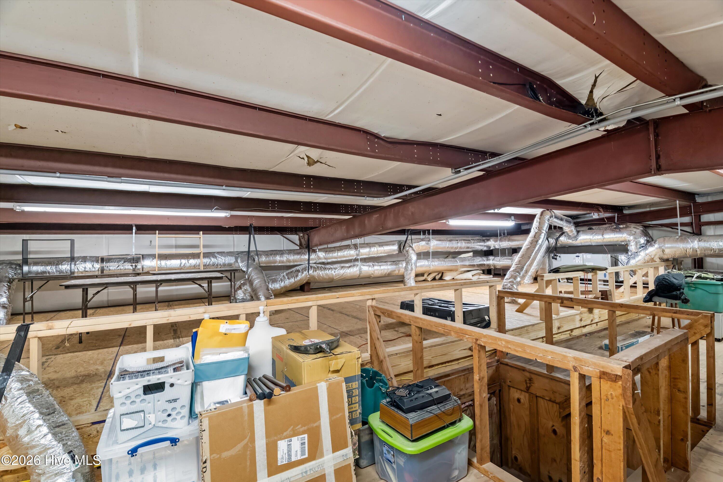 Upstairs floored storage in workshop