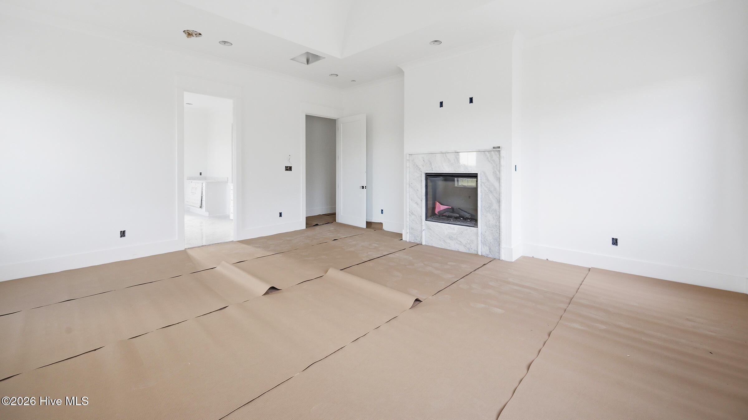 owner suite has a short hall to entry door to add privacy