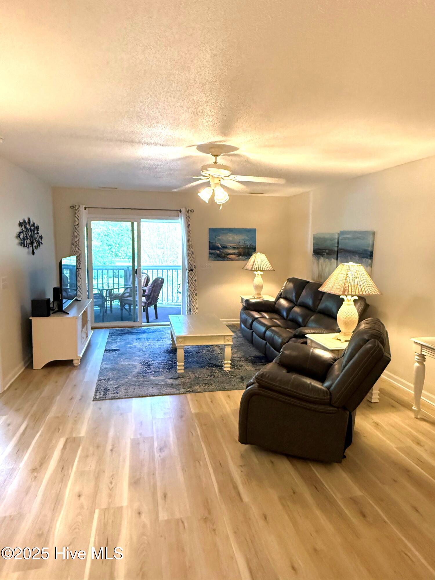 1620 Goley Hewett Road SE Unit 307, Bolivia, NC 28422 – photo 7: LIving room 1