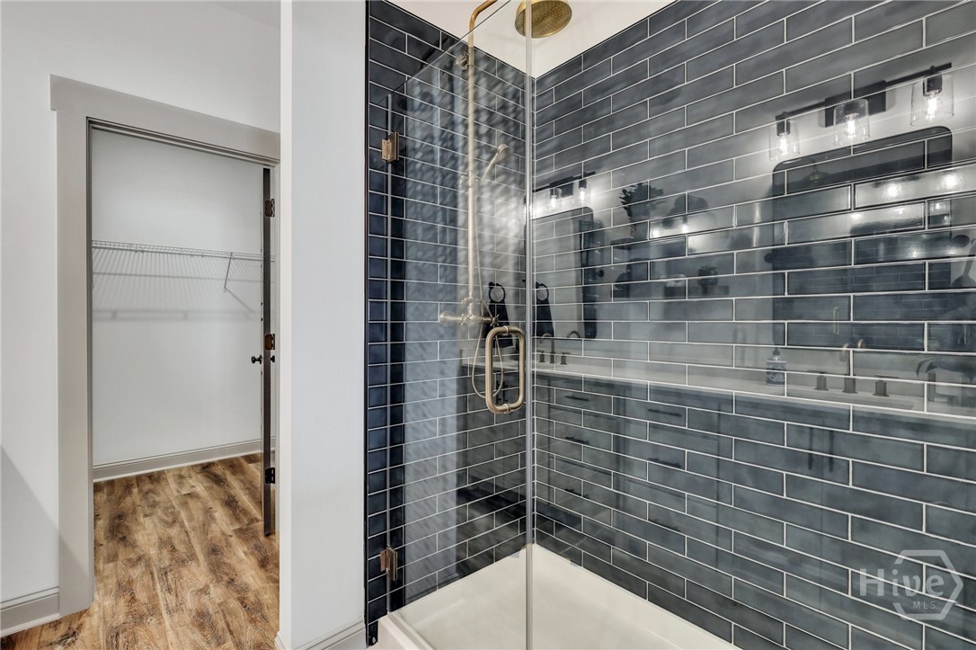 PHOTOS OF A PREVIOUSLY BUILT BRINSON PLAN BY LAWRENCE ALEXANDER HOMES.