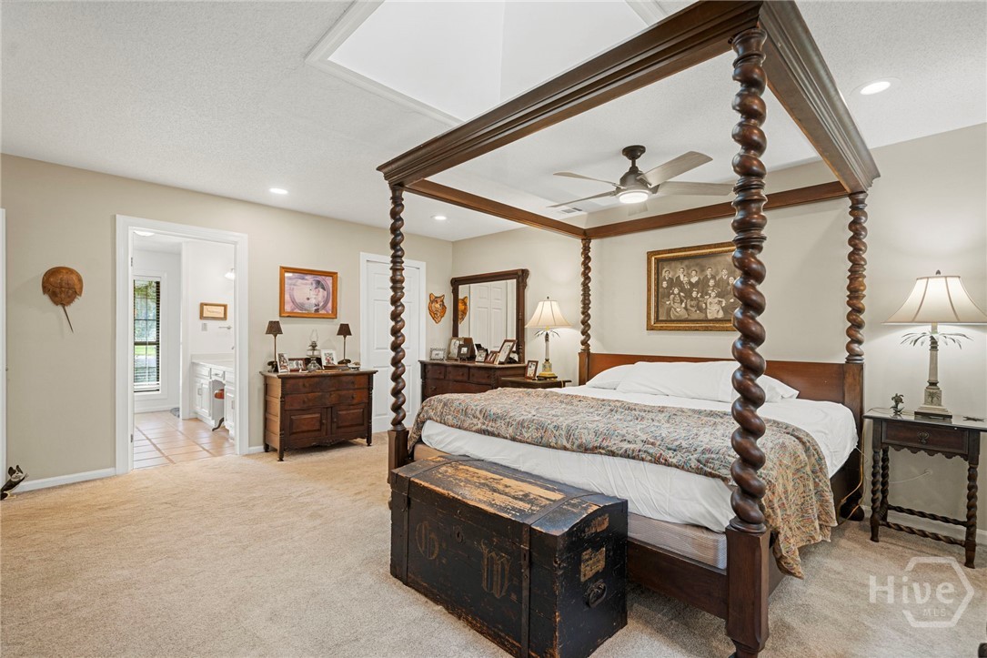 Primary bedroom overlooking the water