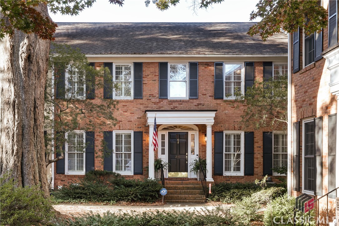 Welcome to this exquisitely renovated 4-bedroom, 3-bathroom townhome located in the highly desirable Five Points area of Athens, GA. Located in the historic, tree-lined Church Street neighborhood, this home offers a blend of luxury and convenience just moments from vibrant Downtown Athens.As you enter, a two-level foyer welcomes you into a bright, open great room featuring a gas fireplace and an elegant dining area. The kitchen is a chef's delight, boasting new quartz countertops, solid-maple cabinetry in crisp white, premium stainless steel appliances, and hardwood floors throughout the main level. A versatile bedroom with an en suite bath on this level can also serve as an office space. Upstairs, the primary suite is a true retreat, featuring a spa-like bath with a jetted soaking tub and a glass-enclosed shower. Two additional spacious bedrooms share an updated hall bath, providing ample space for family or guests.Outside, enjoy a private patio equipped with a hot tub and a Big Green Egg, perfect for relaxation and entertaining. Additional features include a two-car garage, a large laundry room that doubles as a gym space, ample storage, and plentiful parking. Recent upgrades include a newer roof, furnace, and thermal-insulated windows, ensuring comfort and efficiency.This townhome is designed for effortless, stylish living, combining luxury, privacy, and convenience in one of Athens's most desirable neighborhoods. Don't miss the opportunity to make this exceptional property your new home. Renovations include new hardwood floors in all three upstairs bedrooms and hallway, refinished floors in the downstairs foyer, living room, and music room, and plantation shutters installed in 2018. A full renovation was completed in September 2019, featuring new hardwood floors in the media room and kitchen, a rebuilt staircase, new light fixtures and recessed lighting throughout, new cabinets and quartz countertops in the kitchen, bathrooms, and laundry room, new tile floors in the bathrooms and laundry room, and new plumbing fixtures and sinks in all three bathrooms and the kitchen. The master bathroom boasts a new walk-in glass shower and soaking tub. The kitchen is equipped with a Wolf six-burner range and electric stove with a Wolf ventilation hood, a built-in Subzero refrigerator/freezer, a built-in Wolf microwave, a Kitchen-aid icemaker, and a Kitchen-aid dishwasher installed in 2023. Two electric hot water heaters, one new in 2019 and one in 2012, are installed in thecrawlspace. The living room features new gas logs with remote control. The private gated patio was completely landscaped in 2020, including the addition of a Jacuzzi hot tub and a Big Green Egg with an accessory table. A sprinkler system was also installed. New Carrier HVAC units with new ductwork were installed in 2022, with a 2.5-ton unit upstairs and a 2-ton unit downstairs.The master bedroom includes a walk-in cedar closet, and the two-car garage offers storage shelves and attic storage spaces above both the upstairs and the garage. The community features a swimming pool for the twelve residences. This townhome offers a perfect blend of historic charm and modern amenities,making it an ideal choice for those seeking a luxurious and convenient lifestyle in Athens, GA.