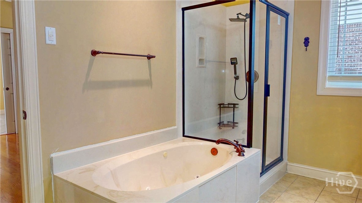 Master Bath 3 with jacuzzi tub.