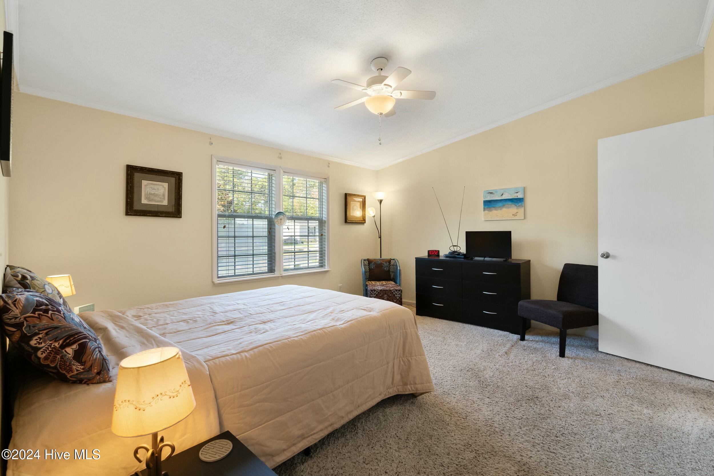 1104 Captains Court, Carolina Shores, NC 28467 – photo 16: Owner's Suite