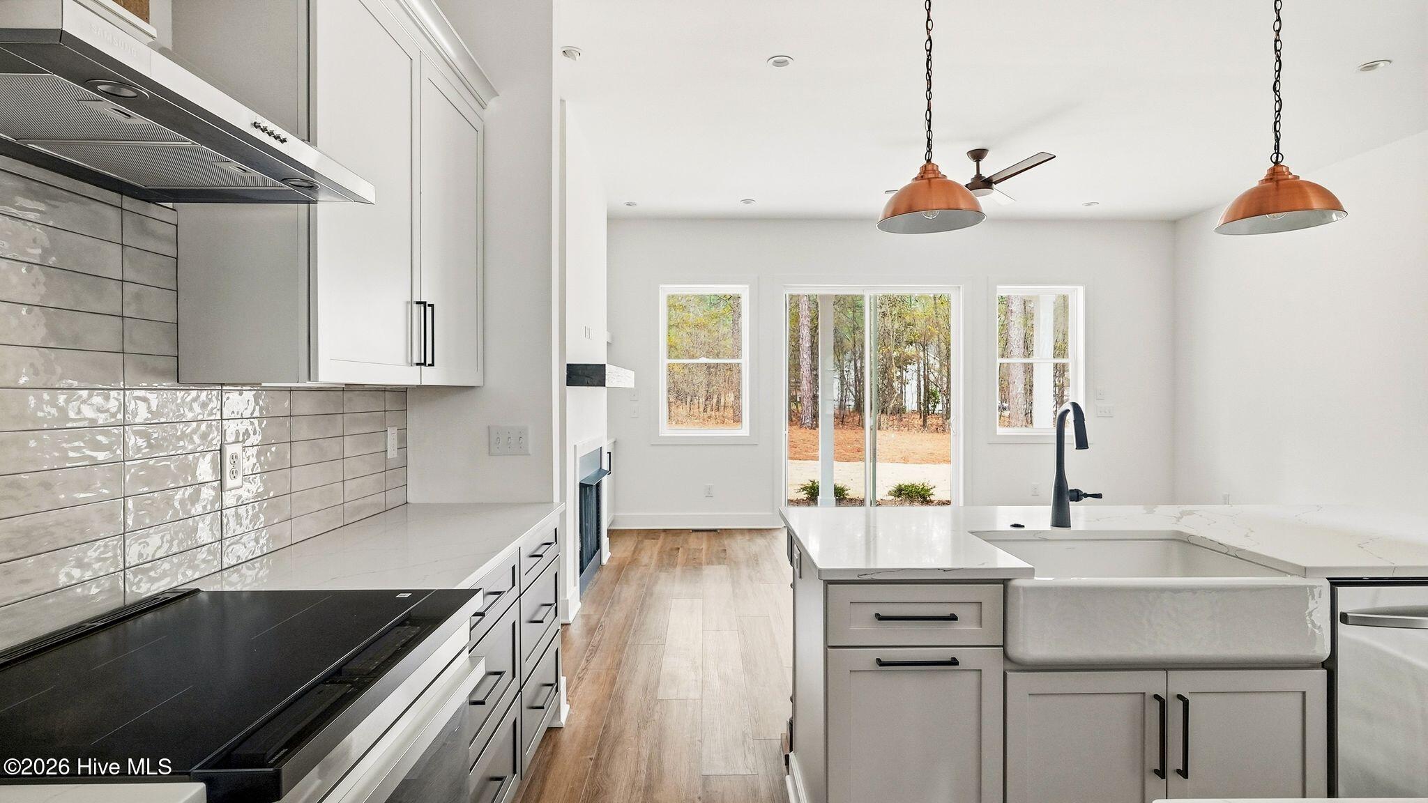 Induction cooktop and subway tile backsplash