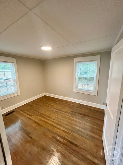 Unit A Bedroom 1 hardwood floors