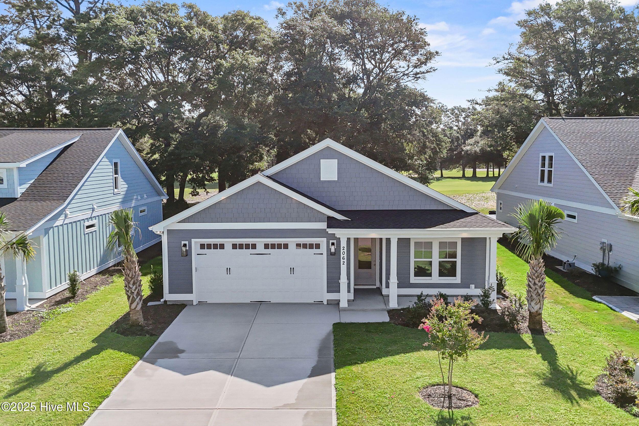 2062 Greenside Manor Drive SW, Ocean Isle Beach, NC 28469 – photo 5: 7_drone