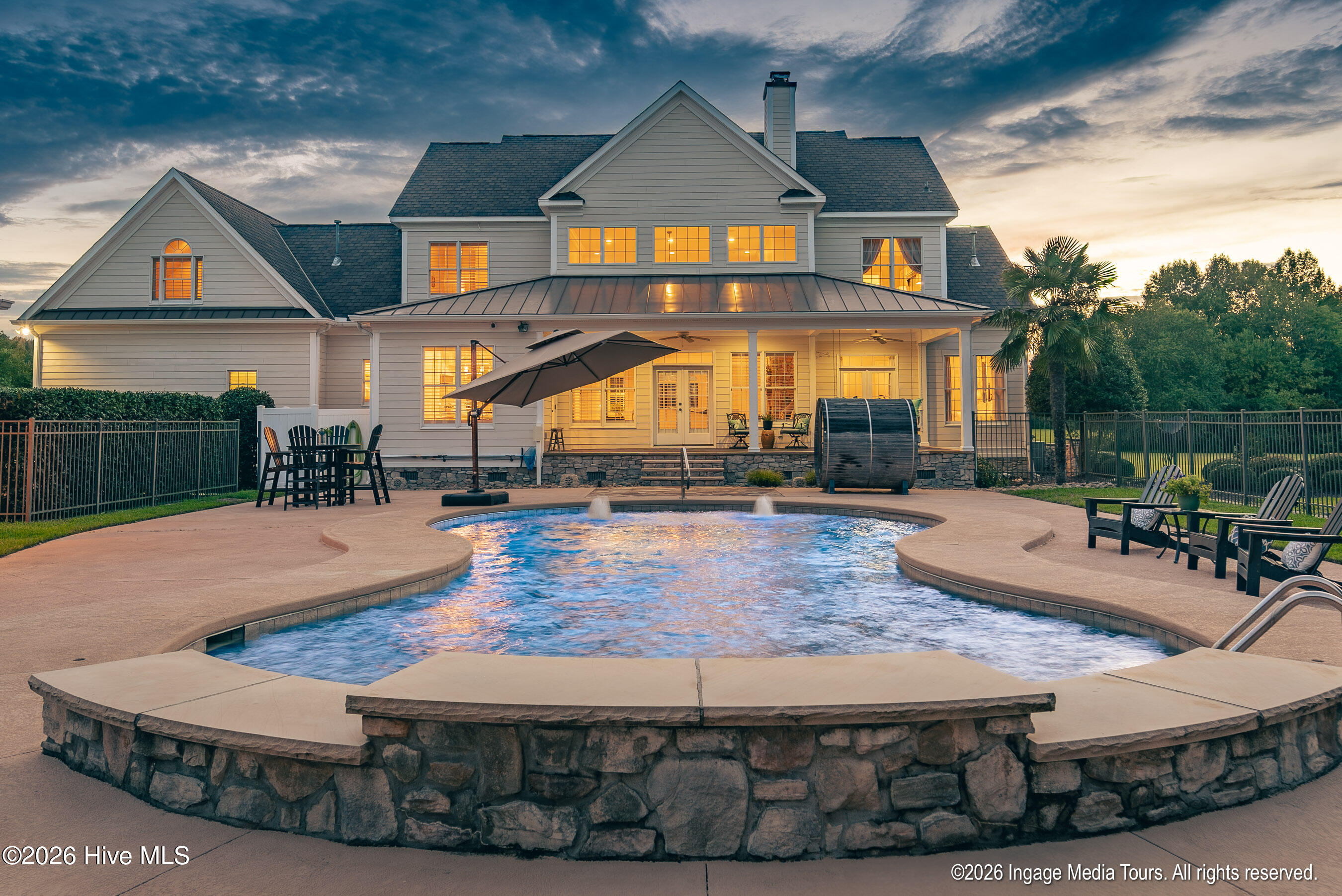 View from pavilion overlooking pool and rear of main house.
