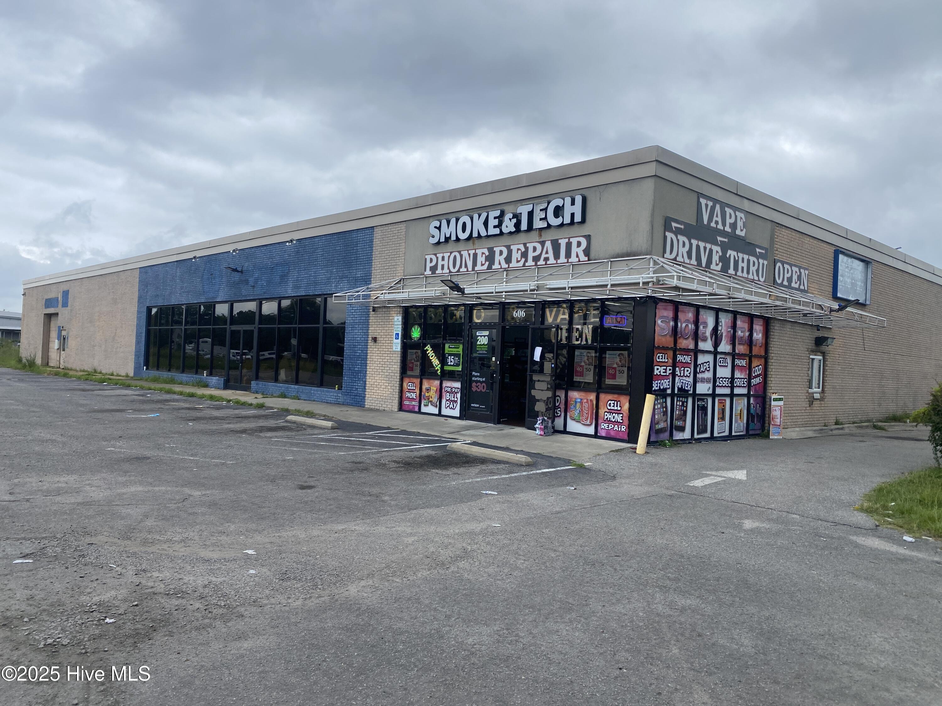 10,200 sf brick building on 1.71 ac on high traffic area.  332 feet road frontage.  Next to Piggly Wiggly shopping center.  Formerly NAPA store.  Currently divided into 3 spaces.  large ashpalt parking lot.  Highway 17 Biz.  Many potential uses.