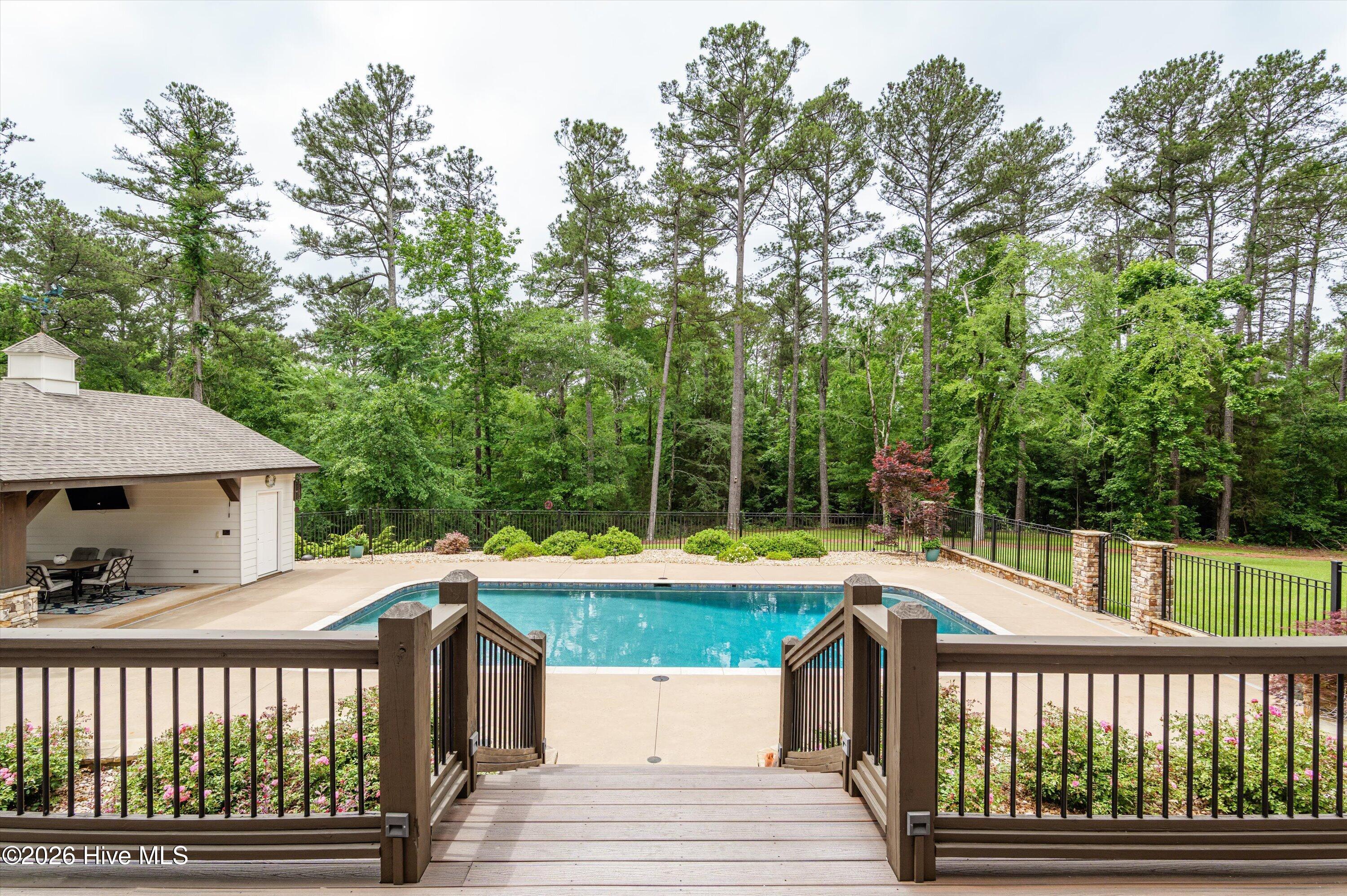 Breathtaking back yard oasis with salt water gunite pool built in 2018