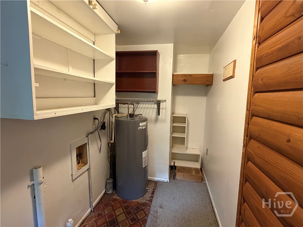 Laundry Room (new flooring coming soon.)