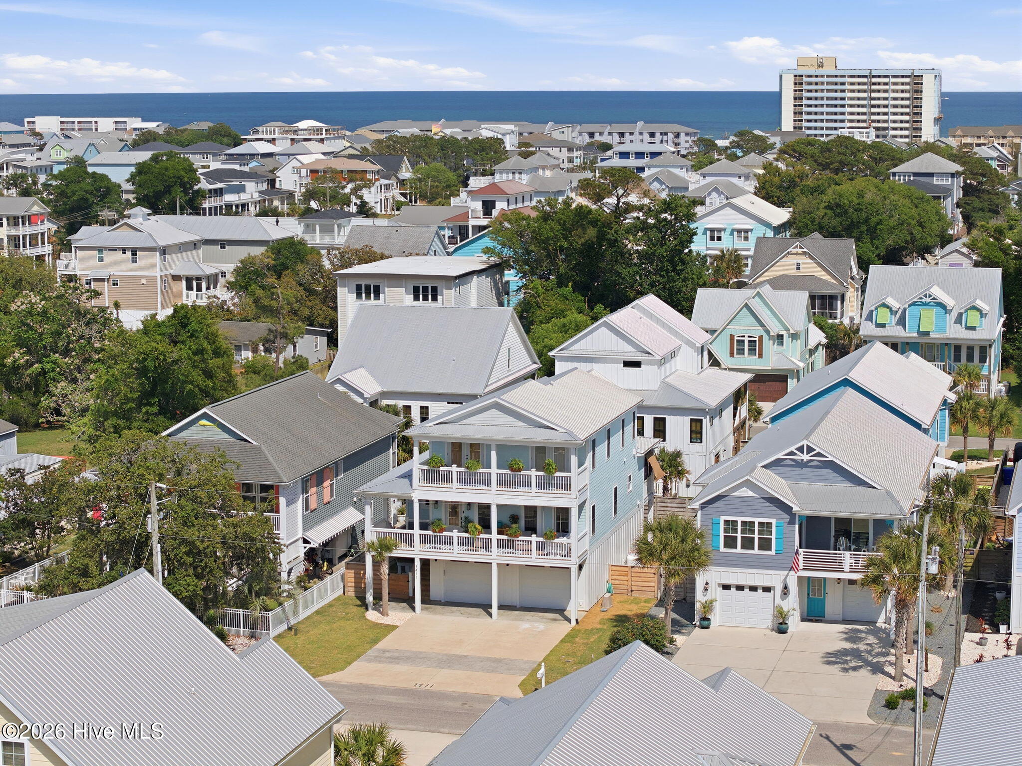 1411 Spot Lane, Carolina Beach, NC 28428 – photo 4: 17-web-or-mls-DJI_20260514153921_0302_D