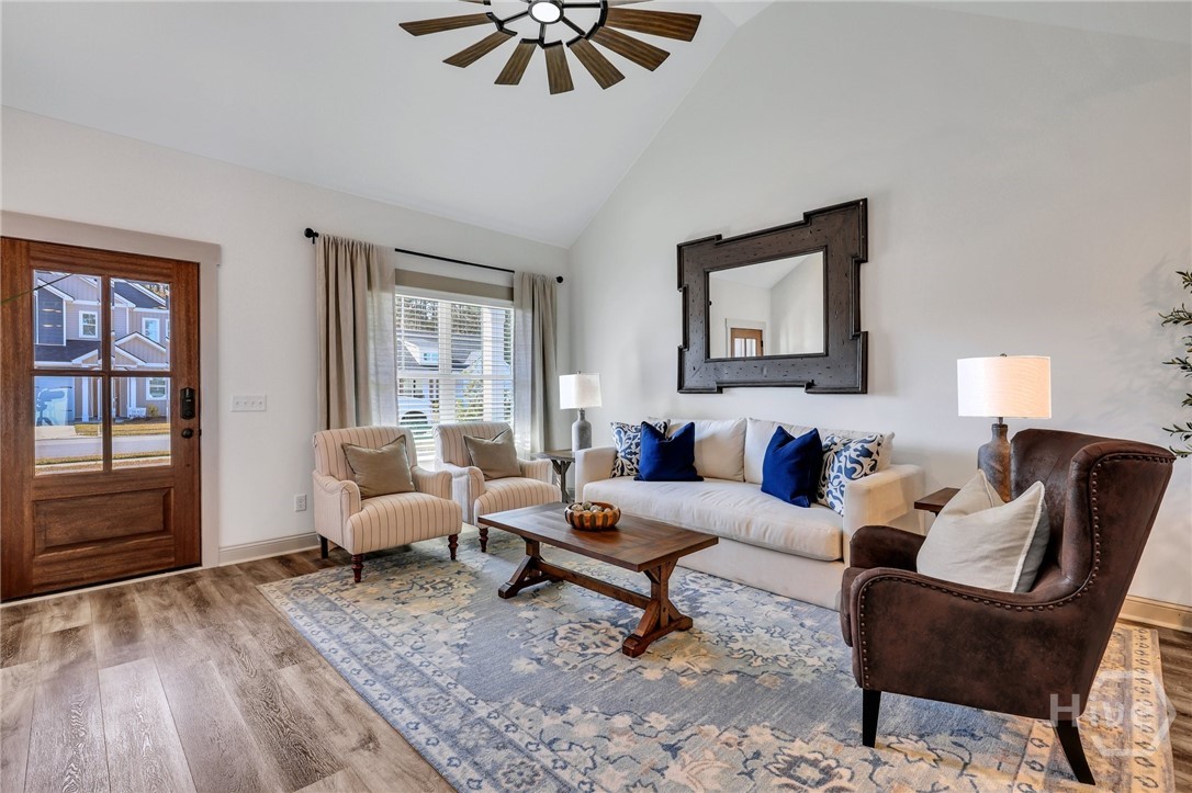 PHOTOS OF A PREVIOUSLY BUILT BRINSON PLAN BY LAWRENCE ALEXANDER HOMES.