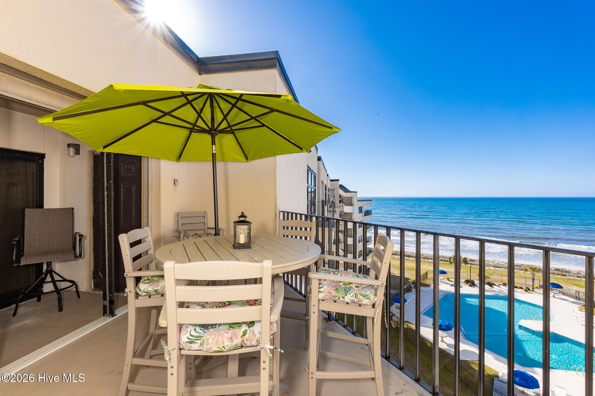 Large patio with room for entertaining and enjoying the beach side life!