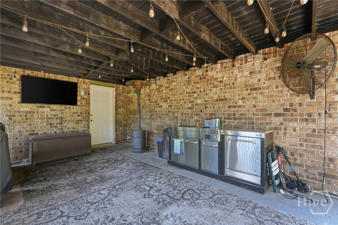 Grilling/Entertainment area under back screened porch