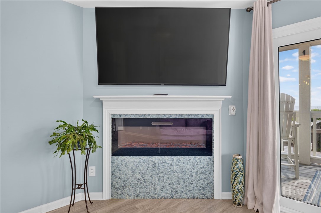 Converted fireplace, new flooring, fresh paint throughout