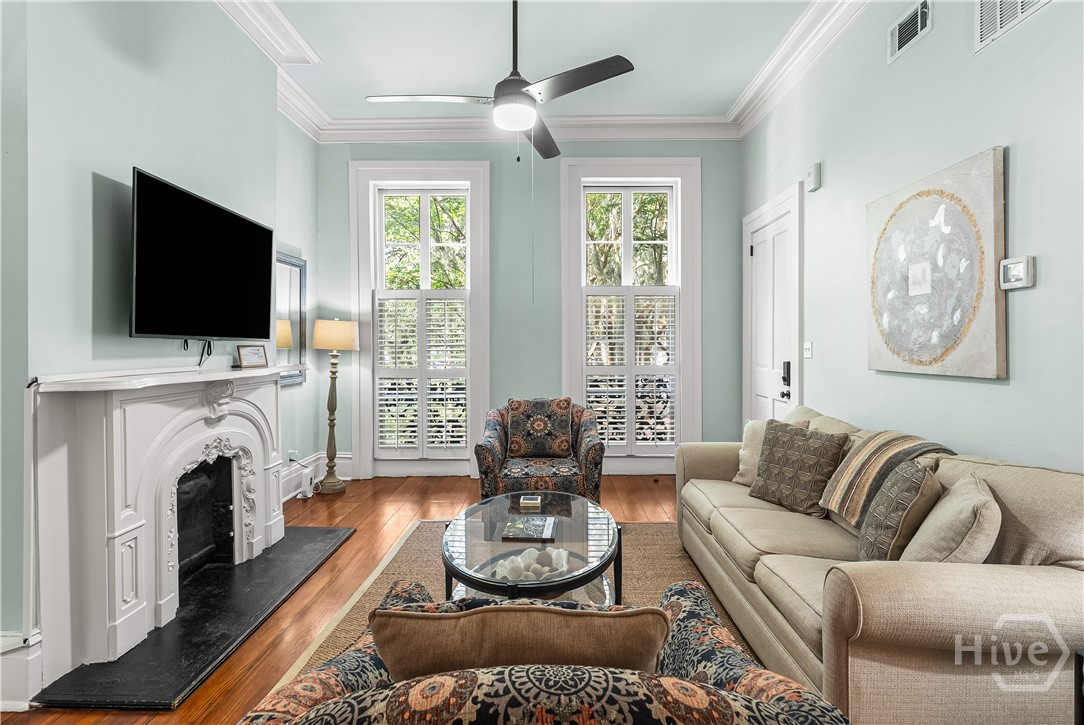 Living room. Great windows. Wide crown moulding.