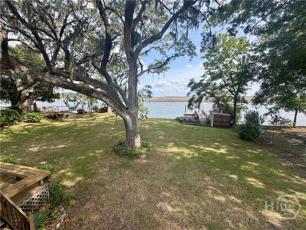 Magnificent front and back live oak trees