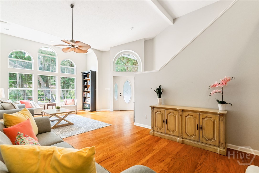 Open Concept Oversized Living Room Features Vaulte