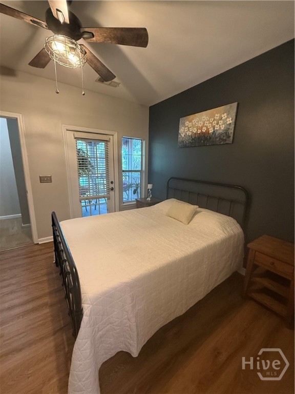 Bedroom looking to the screened porch balcony