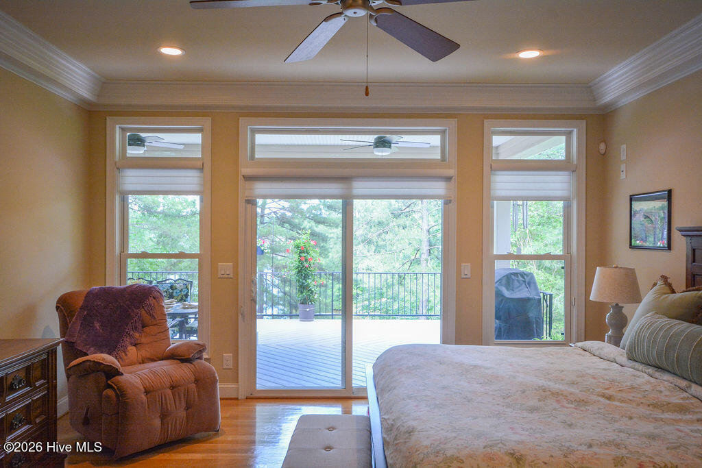 Primary Bedroom w/ doors to upper deck