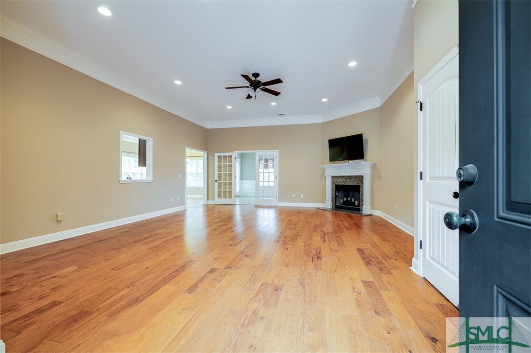 Great room with hand-scraped hardwood flooring