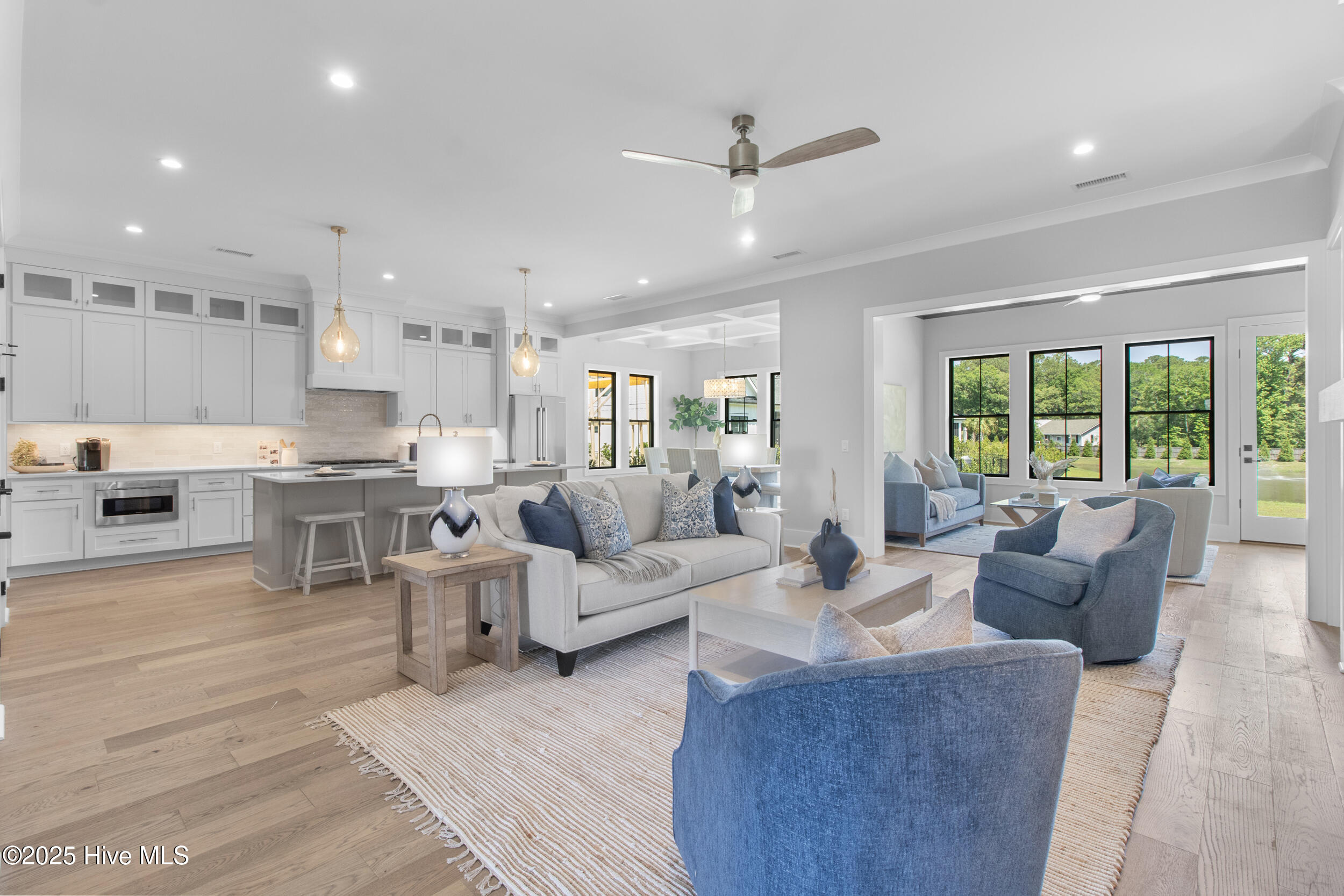 All wood cabinetry throughout home and kitchen to the ceiling!