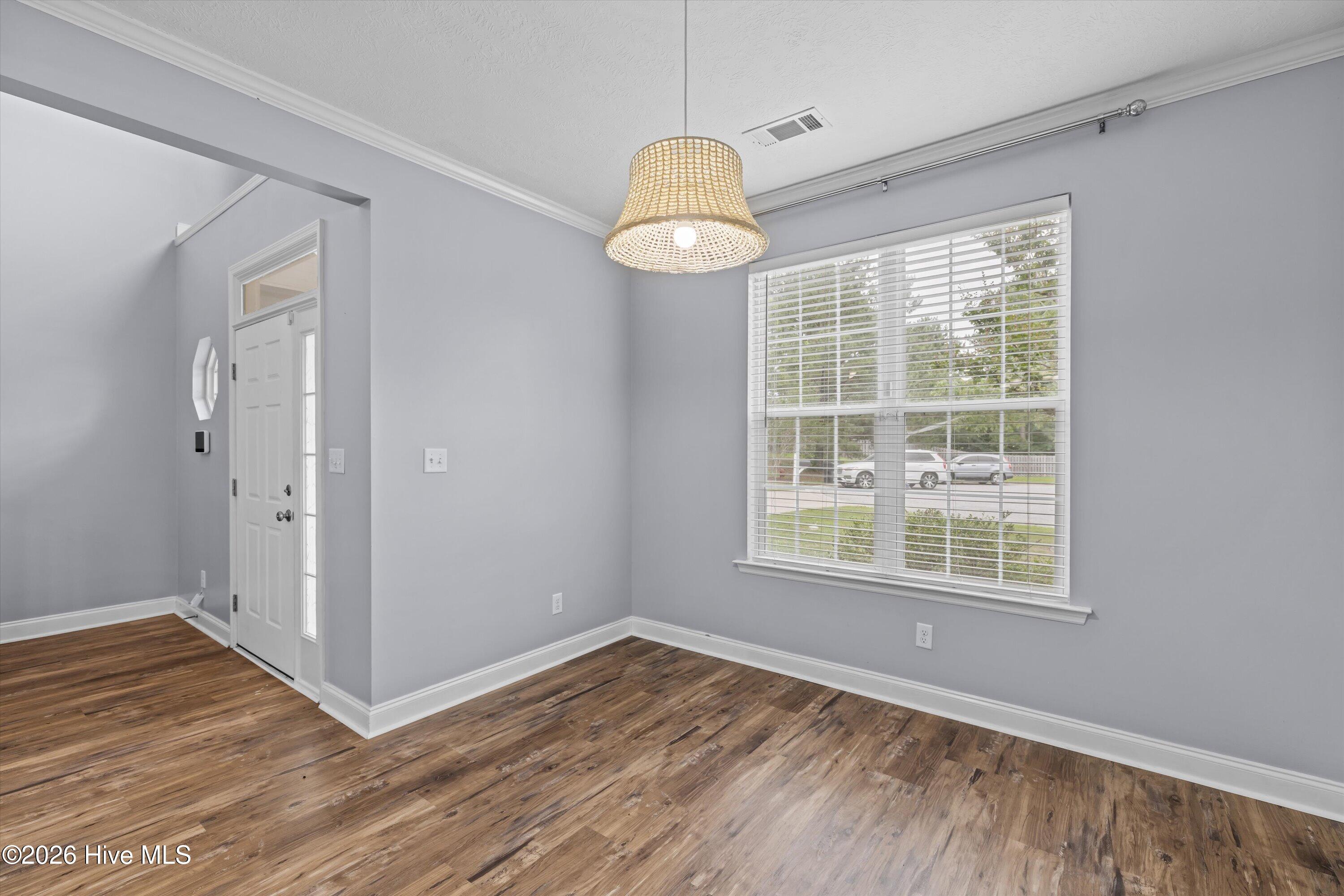Formal living room looking to foyer