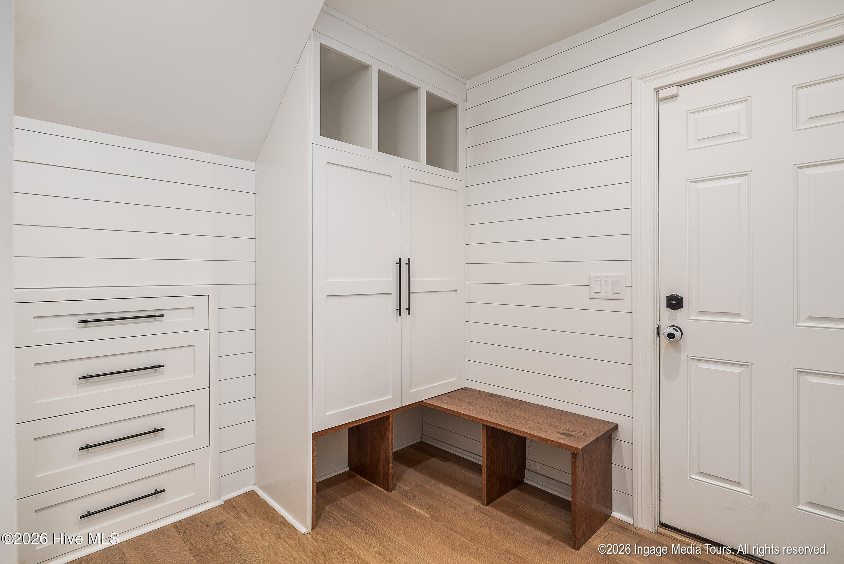 Entry nook from attached garage with tons of storage