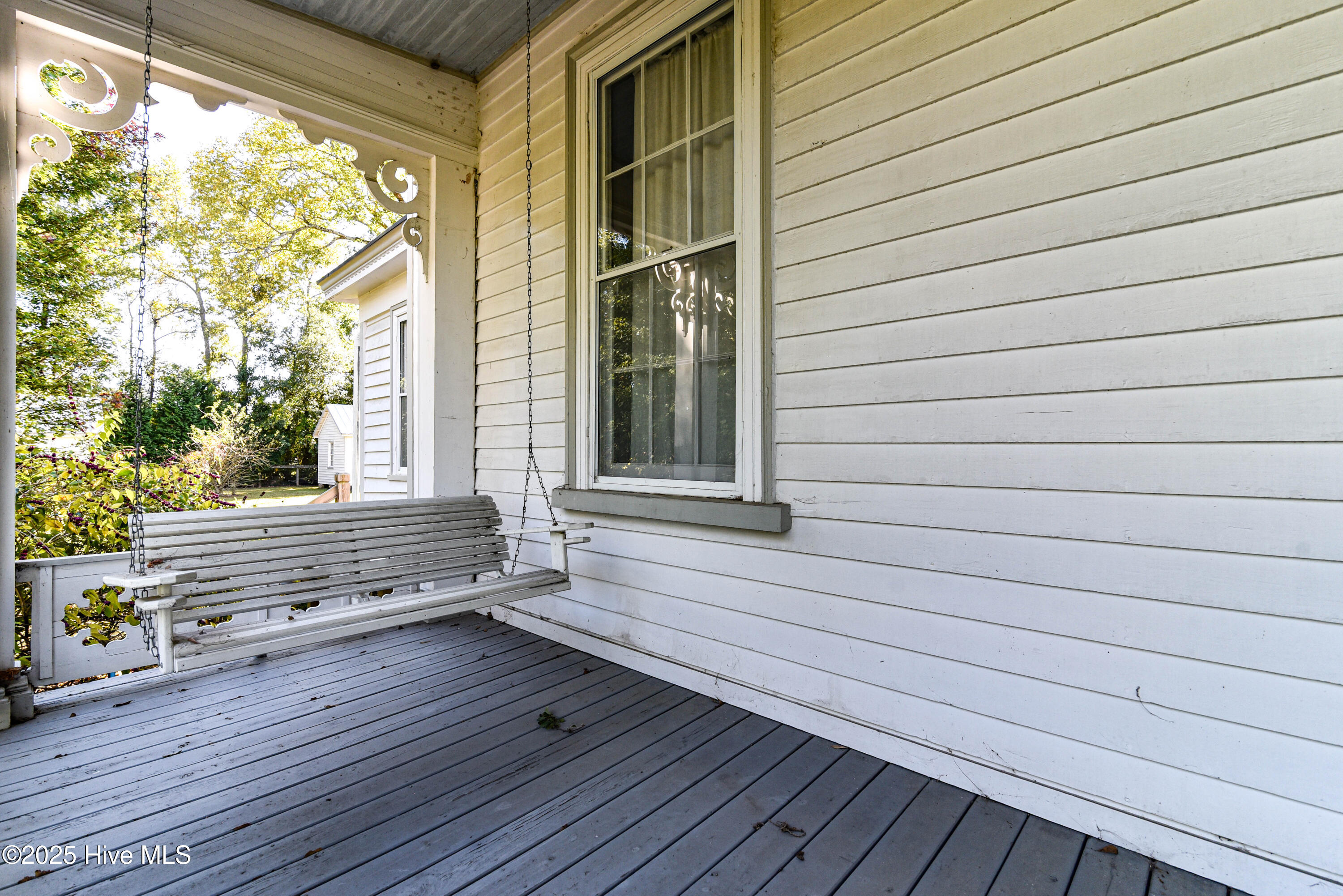Left porch with swing