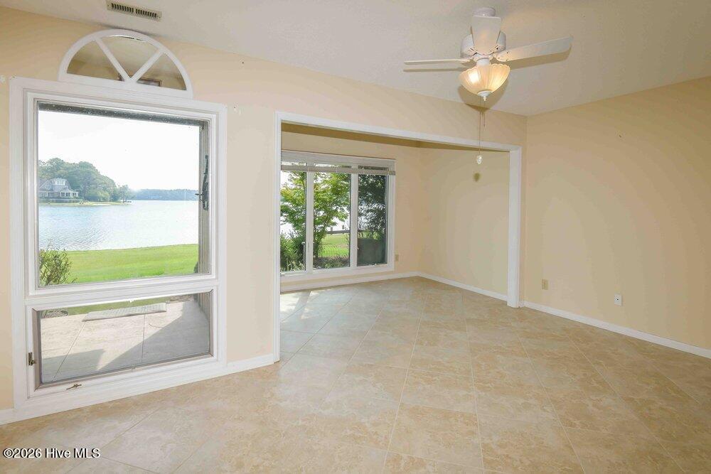 downstairs bedroom with views and sitting area