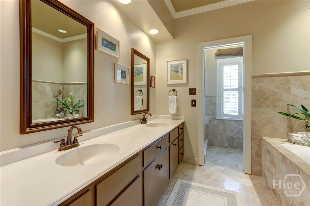 Primary ensuite with double vanities