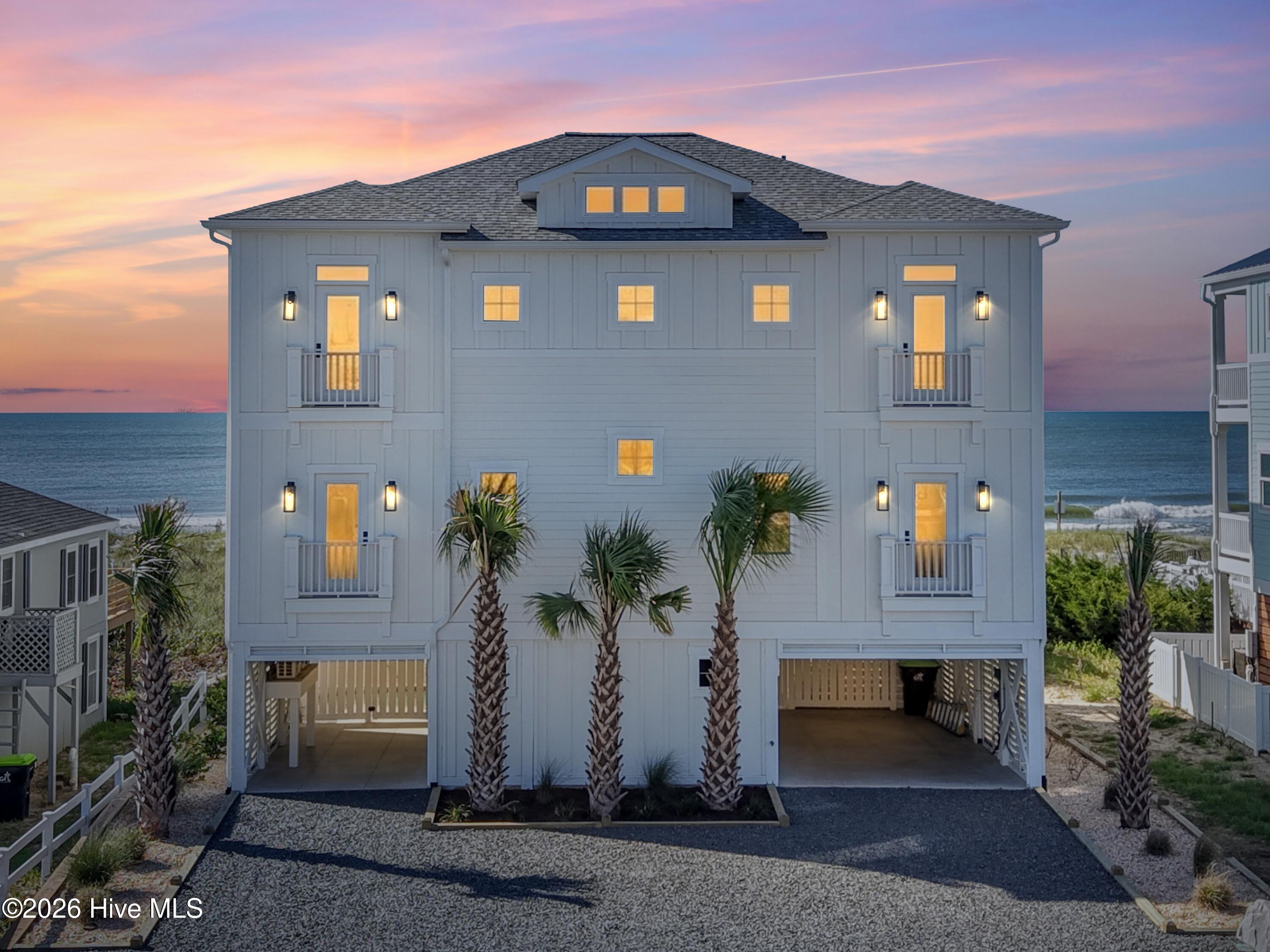 Exterior photo of 105 Ocean Boulevard W, Holden Beach, NC 28462. MLS: 100525710