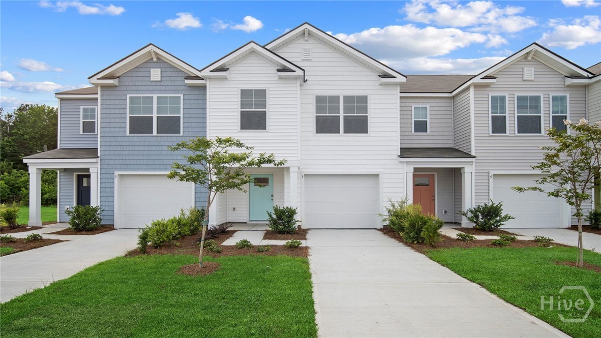 LIMITED TIME SPECIAL PRICING! MOVE IN READY! CELEBRATE 250 YEARS OF FREEDOM WITH THIS SPECIALLY-PRICED '250' HOME! NEW CONSTRUCTION TOWNHOME IN SOUTH EFFINGHAM DISTRICT! Nestled in the heart of Rincon, GA, is the Towns at Blue Jay - a charming townhome community offering small town appeal in a highly rated school district with convenient access to the greater Savannah area. Meet the Dillon - a coveted floor plan comprised of 1,693 square feet with 3 bedrooms, 2.5 baths, and a 1 car garage - boasting plenty of space for everyone. From the covered porch, enter foyer which leads directly to a well-placed coat closet and half bath, adjacent to a spacious kitchen. Enjoy the luxuries of stainless steel appliances, including washer/dryer & refrigerator, pantry, ample counterspace, double basin sink, and a breakfast bar. A dedicated dining space and family gathering area overlook the spacious back patio, rounding out the first floor. Upstairs holds an expansive and private primary bedroom with ensuite bath, including double vanity, standalone shower, and a walk in closet. Two secondary bedrooms share another full bath with shower and double vanities. An upstairs laundry room provides an additional convenience. With proximity to exceptional schools, the modern conveniences of shopping and dining, and low maintenance community living, The Towns at Blue Jay is the next place you want to call home! Home is under construction. Pictures, photographs, colors, features, and sizes are for illustration purposes only and will vary from the home as built. Photos are not of the subject home.