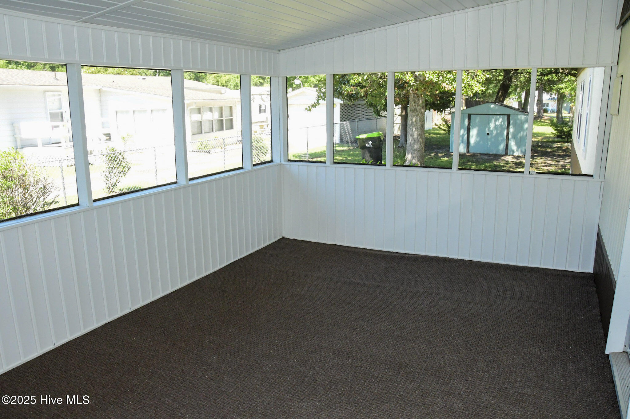9040 Bonaparte Drive SW, Calabash, NC 28467 – photo 13: Screened Porch