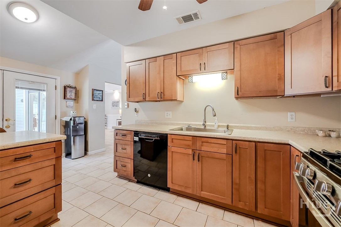 Plenty of lighting and a ceiling fan for your comfort!