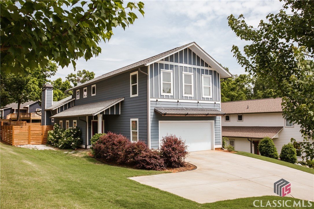 Beautiful, modern 3 bedroom two 1/2 bath home in Chicopee Dudley Neighborhood. Barely-lived in. .234 acres with new survey. Soaring ceilings in open concept living and kitchen area leading to spacious back porch & fenced in yard. Primary bedroom on main level. 2 additional bedrooms upstairs + flex space. 2 car garage. The best of in-town living - walkable to the Greenway with walking & bike trails, Downtown Athens shopping & dining, parks & the Firefly Trail.