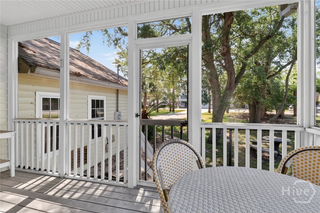 Screened porch off of dining area
