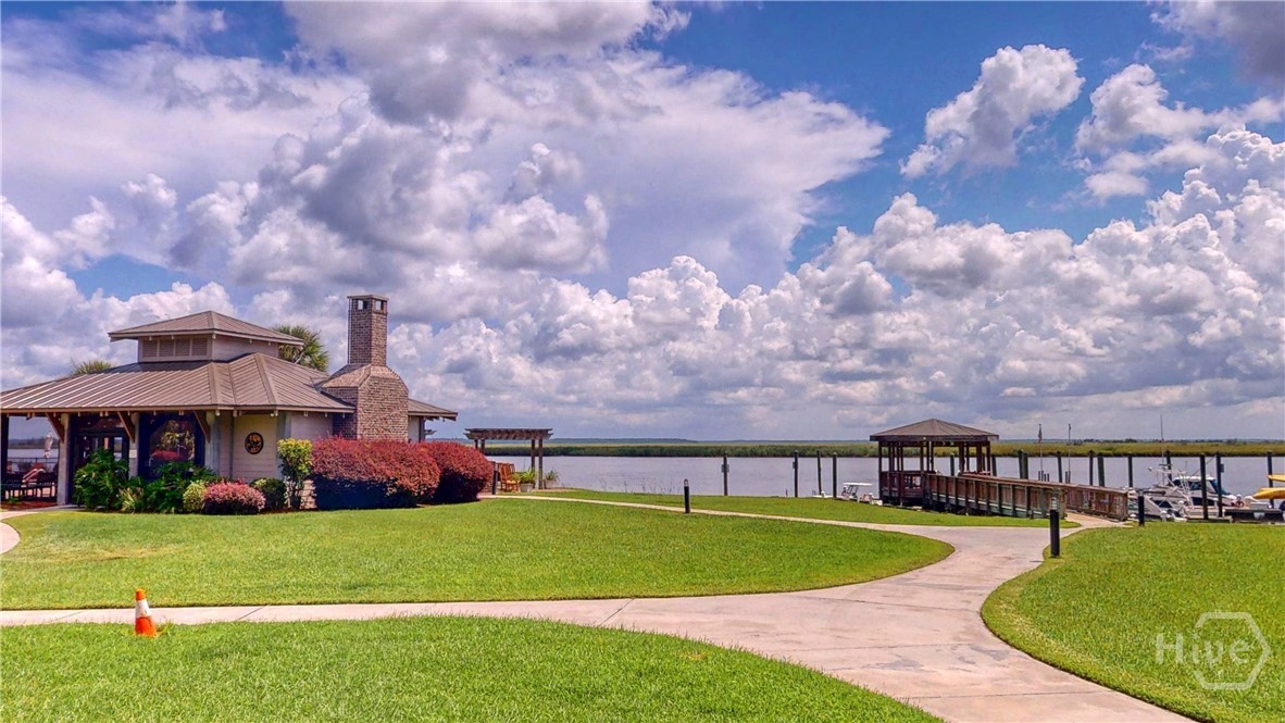 Clubhouse and grill area on the left with the ramp and boat docks on the right.