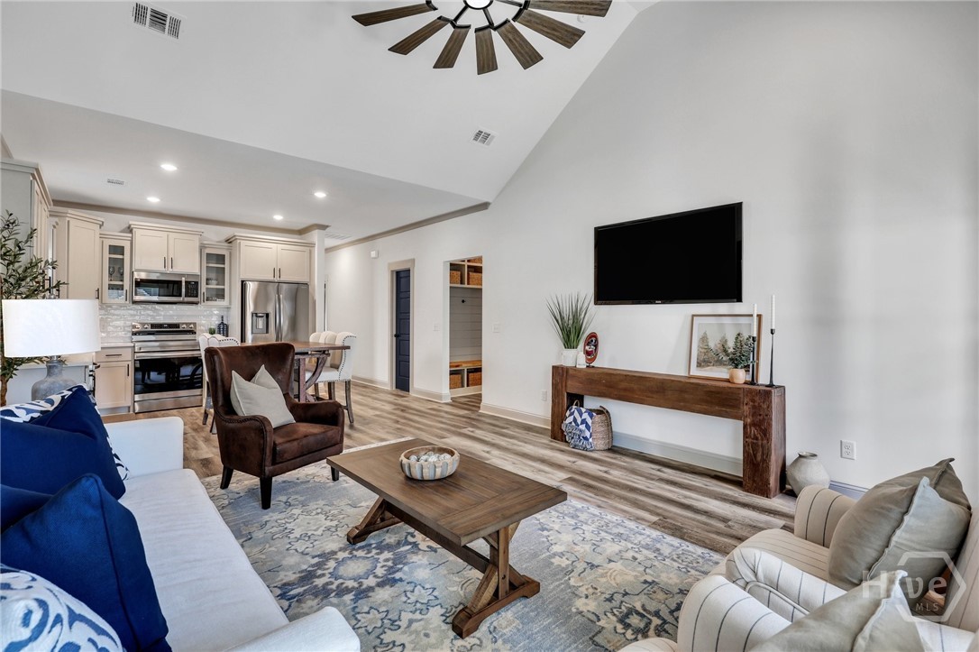 PHOTOS OF A PREVIOUSLY BUILT BRINSON PLAN BY LAWRENCE ALEXANDER HOMES.
