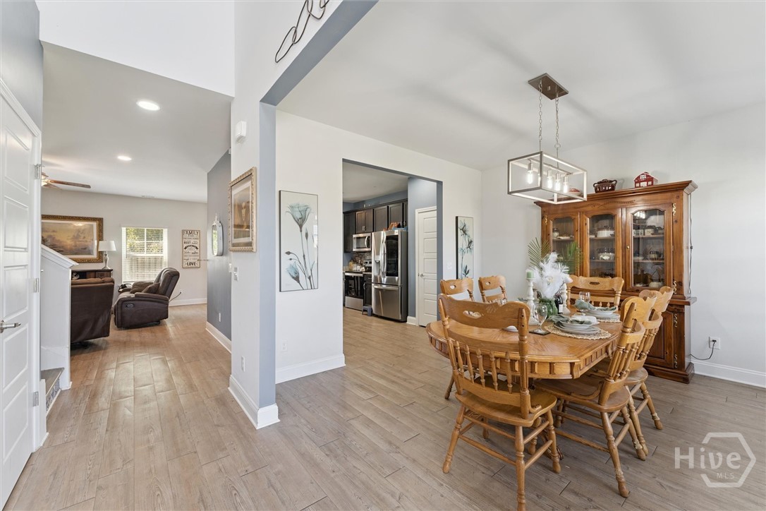 Entry, dining room on right and door to 2-car gara