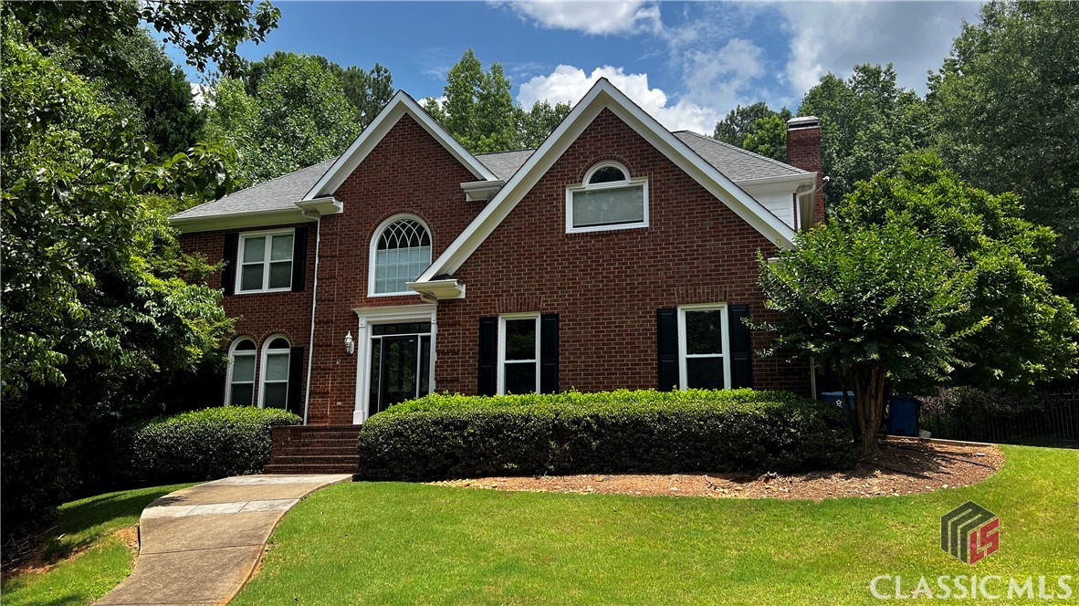 Welcome to another beautiful home in the Riverbottom Subdivision! This traditional two-story brick home is located in a peaceful cul-de-sac surrounded by trees and privacy. The main level has a beautifully updated kitchen and multiple living areas, providing ample relaxation and entertainment space. A charming sunroom invites you to enjoy the outdoors year-round.Upstairs, you’ll find four spacious bedrooms and two full baths, providing plenty of room for your family or guests. The lower basement level features an additional living area, a bedroom, a full bathroom, and abundant storage space, making it an ideal setup for a guest suite or a private retreat.The backyard of this home really makes this one special. The level, fenced backyard is perfect for gatherings and play, and it features a large pool, offering endless fun and relaxation during those warm Georgia days.