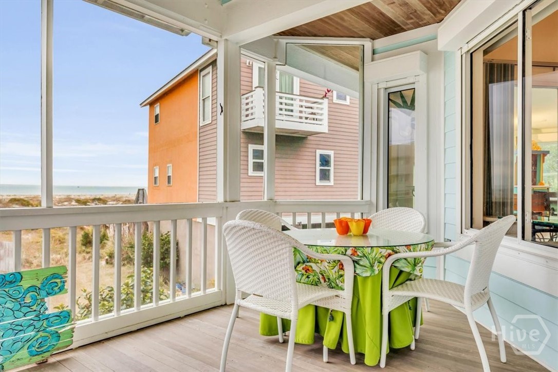 Amazing screened in porch overlooking the ocean