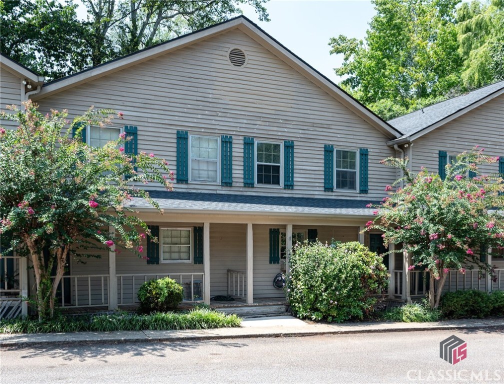 Welcome to this charming East Side Athens condo, perfect for game day enthusiasts, college students, investors looking for an income-producing property, or anyone seeking ultimate convenience. Situated just minutes from shopping, the UGA main campus (including less than 2 miles to the Vet School), Loop 10, entertainment, the Athens bus line, and more, this property offers an unbeatable location.Step inside to discover an open and inviting main living area, ideal for entertaining. The spacious living room features a cozy wood-burning fireplace, a natural stone hearth, and a pine surround. The kitchen has plenty of cabinets and all appliances, making meal preparation a breeze.Upstairs, the split-bedroom layout ensures privacy, with each bedroom featuring a private bathroom, large closets, and generous storage space. Durable LVP flooring throughout the home makes upkeep easy. One shower has been completely redone, and both bedrooms are equipped with new ceiling fans and remotes.The fenced-in patio provides a perfect outdoor space for grilling, lounging in a hammock, or soaking up Georgia's beautiful weather. Covered porches offer additional outdoor living areas, ideal for enjoying those cool spring and fall days. Fresh paint and other recent updates make this condo move-in ready!Don't miss your chance to own this delightful condo in a prime location!